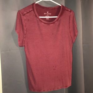 Washed out red t-shirt.